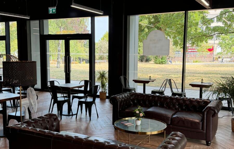 Leather sofas and seating overlooking the park